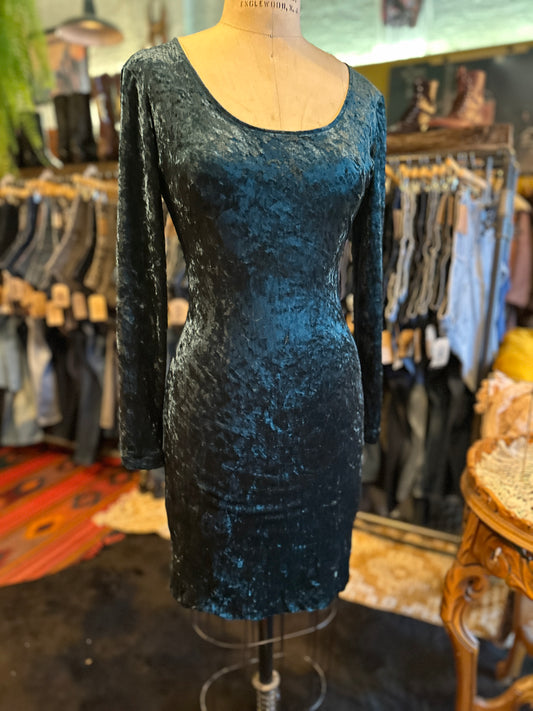 Emerald green velvet dress