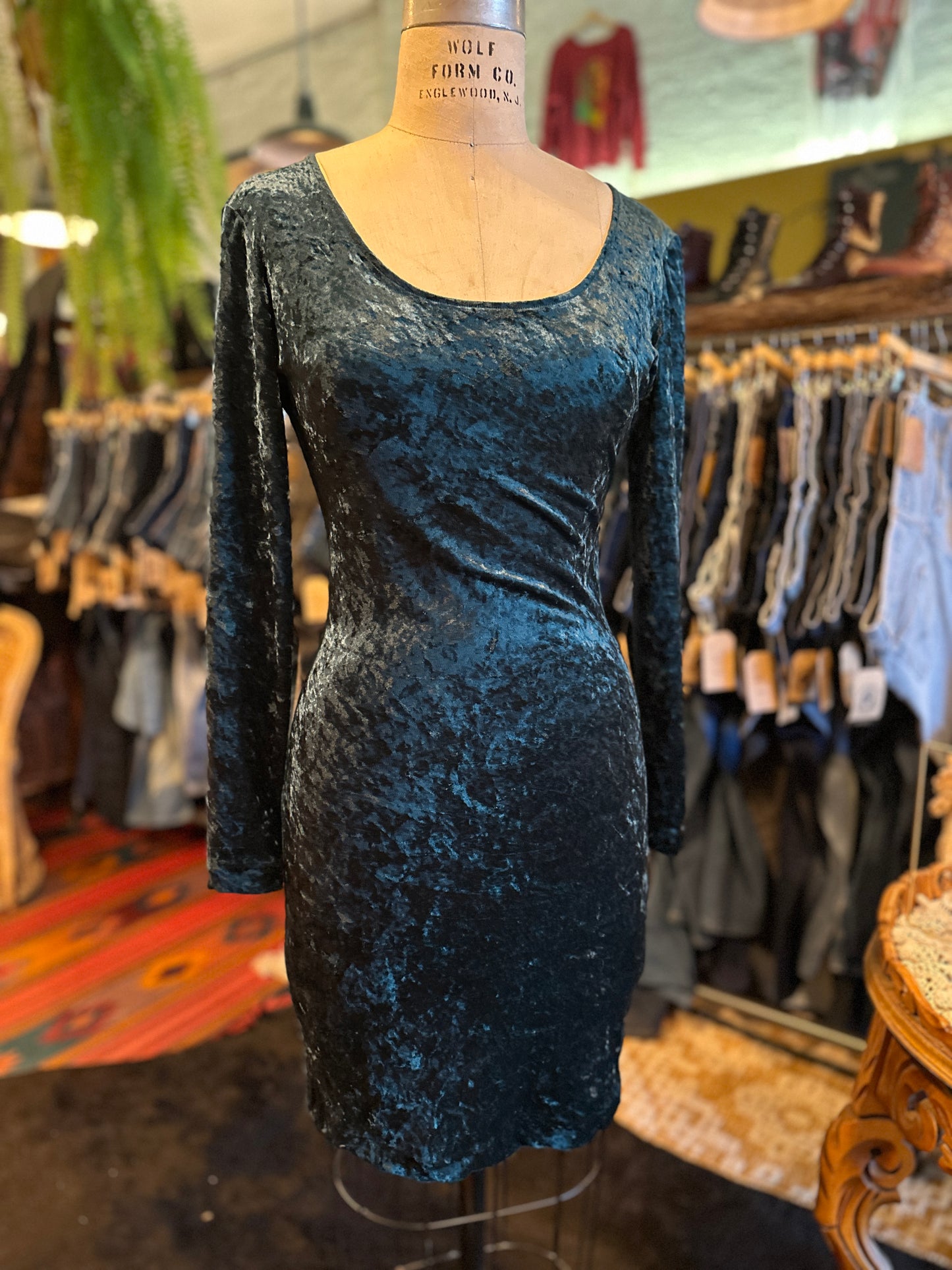 Emerald green velvet dress