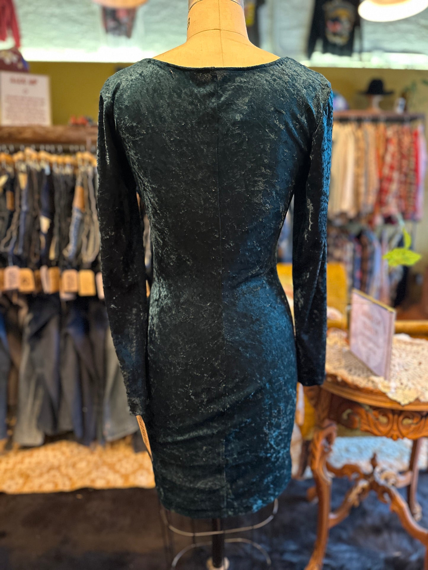 Emerald green velvet dress