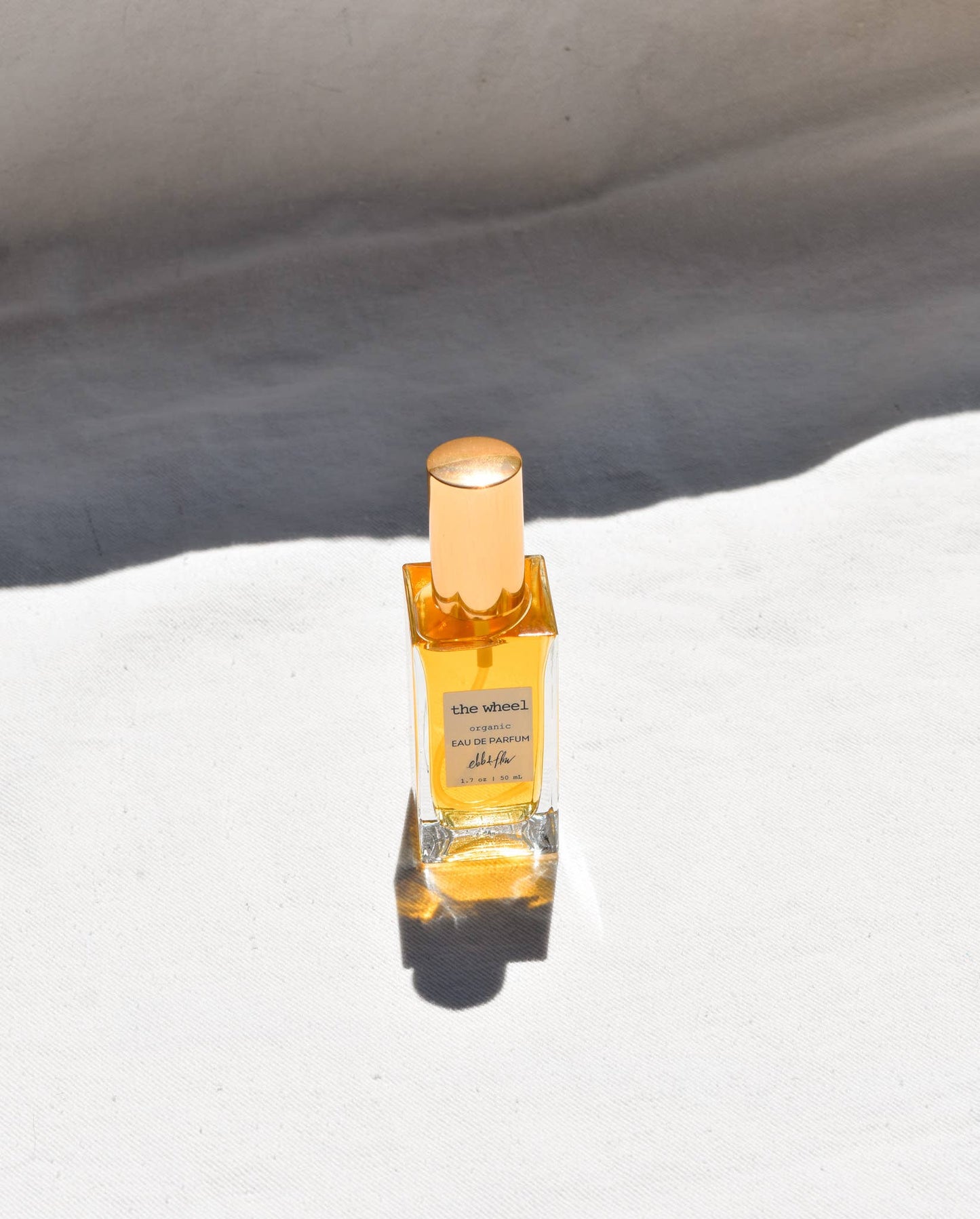 The Wheel - Organic Perfume - Rosewood x Amber x Patchouli: Travel / Mini